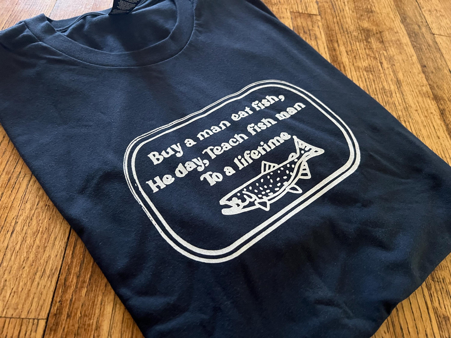 Buy a man eat fish, He day, Teach fish man To a lifetime T-Shirt