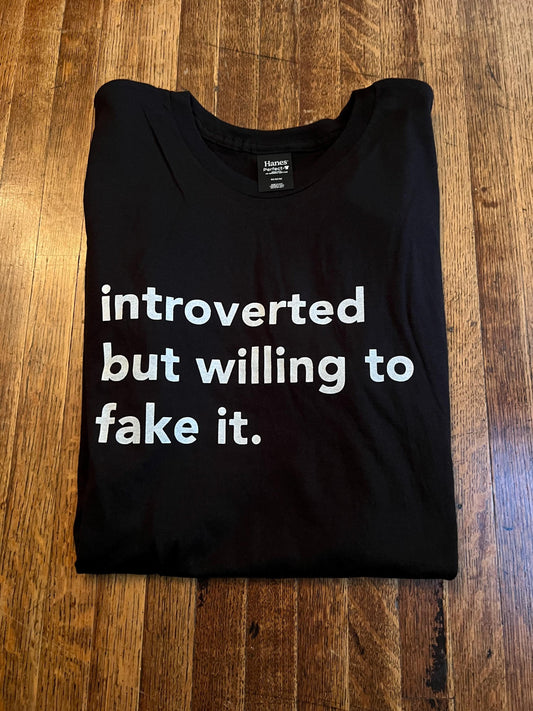 introverted but willing to fake it. unisex t-shirt